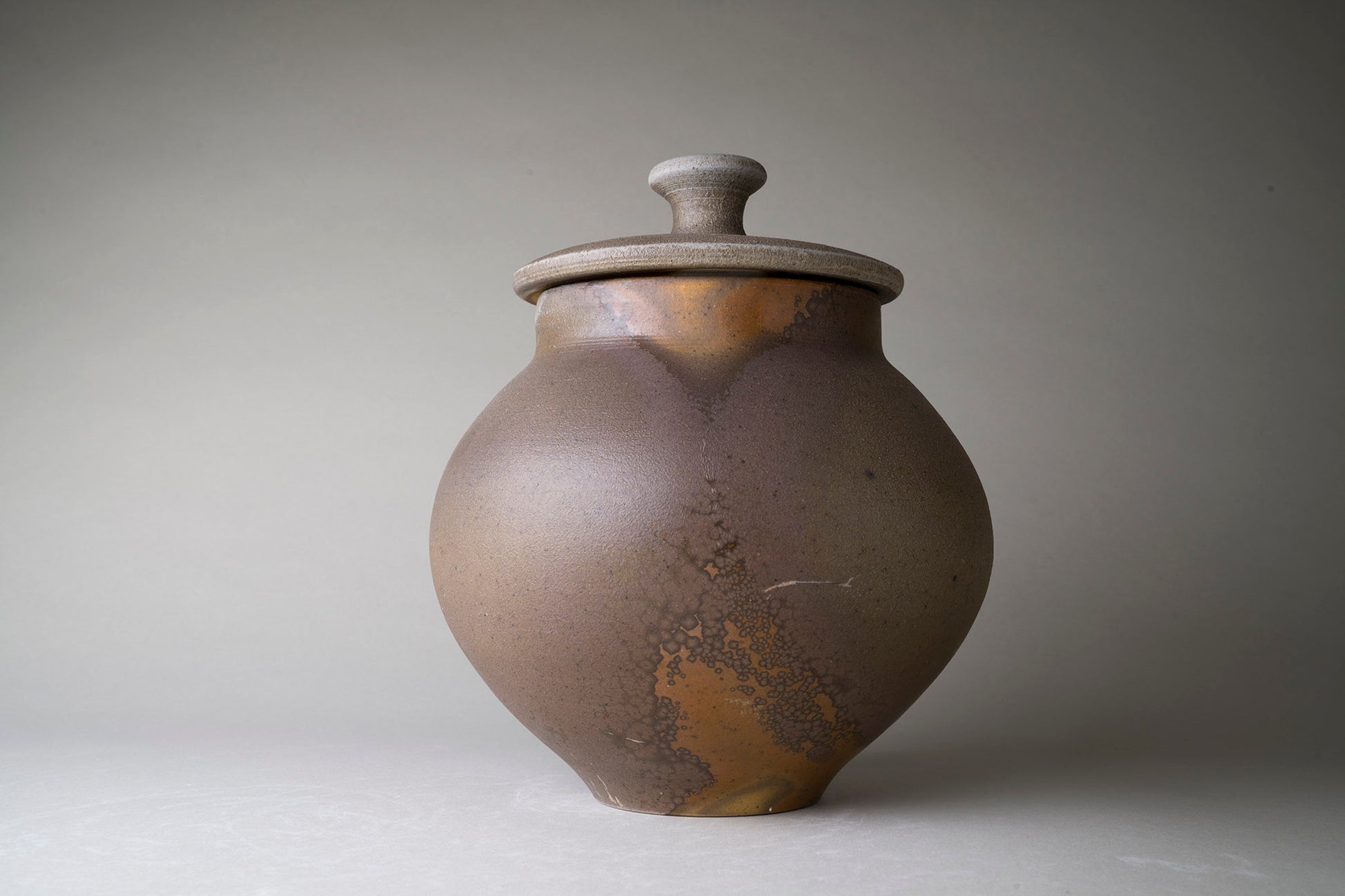 Brown pot with lid