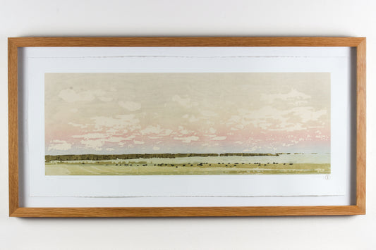Framed wood print landscape of a soft pink sky and a field of grazing bison.