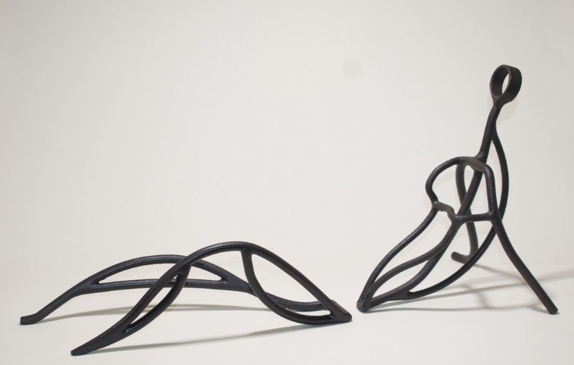 Two piece steel reclining figure