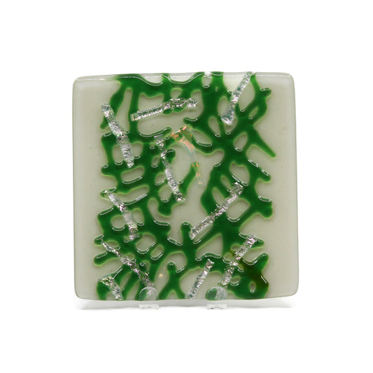 white plate with green stingers