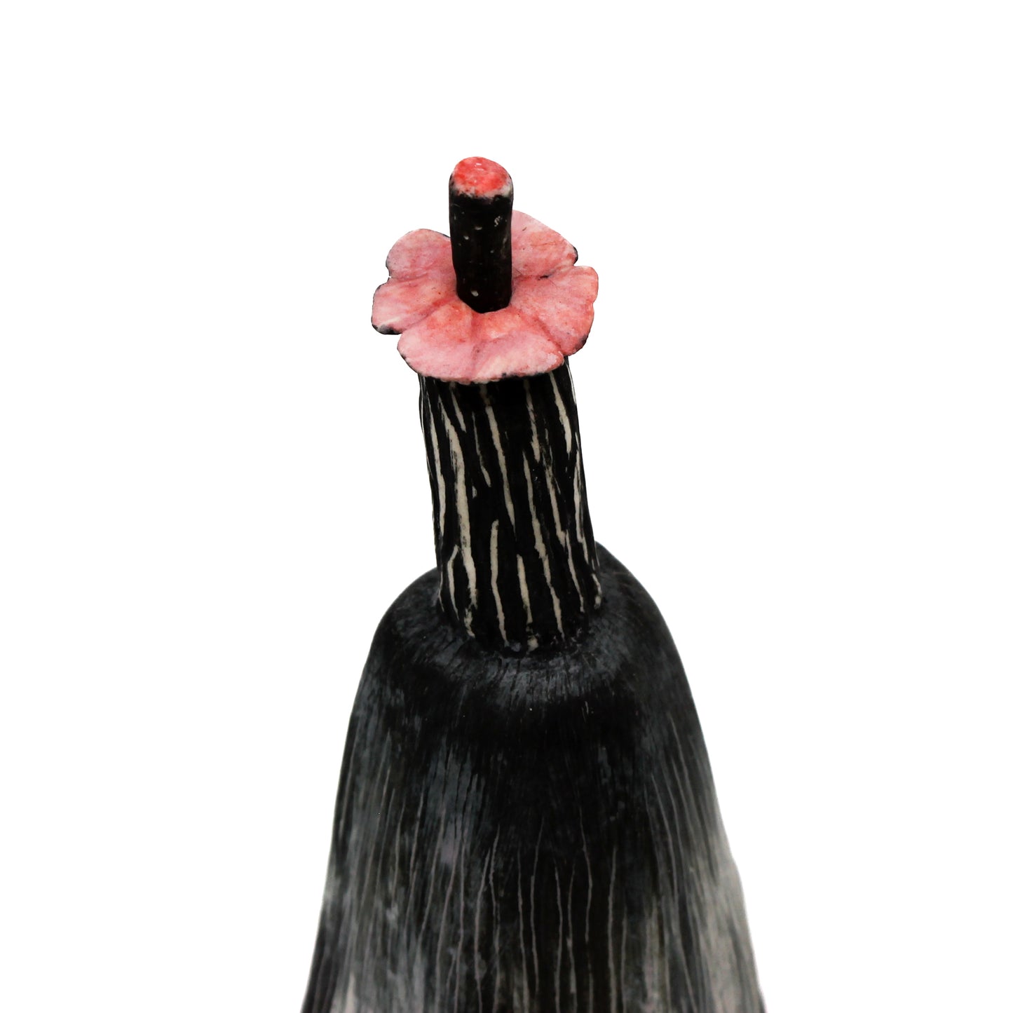 Pink flower stopper on black pod bottle