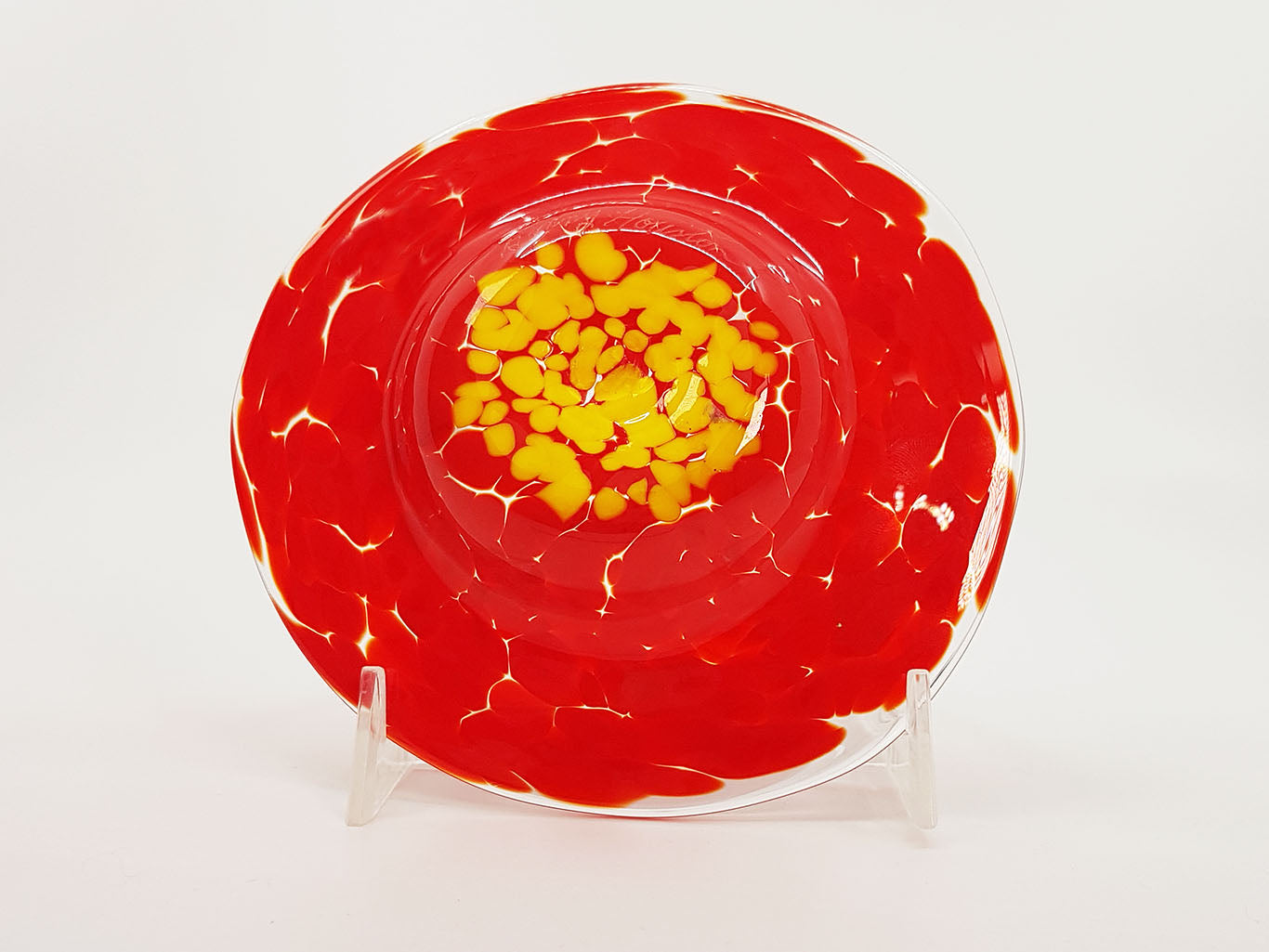 Red and yellow wide rimmed bowl