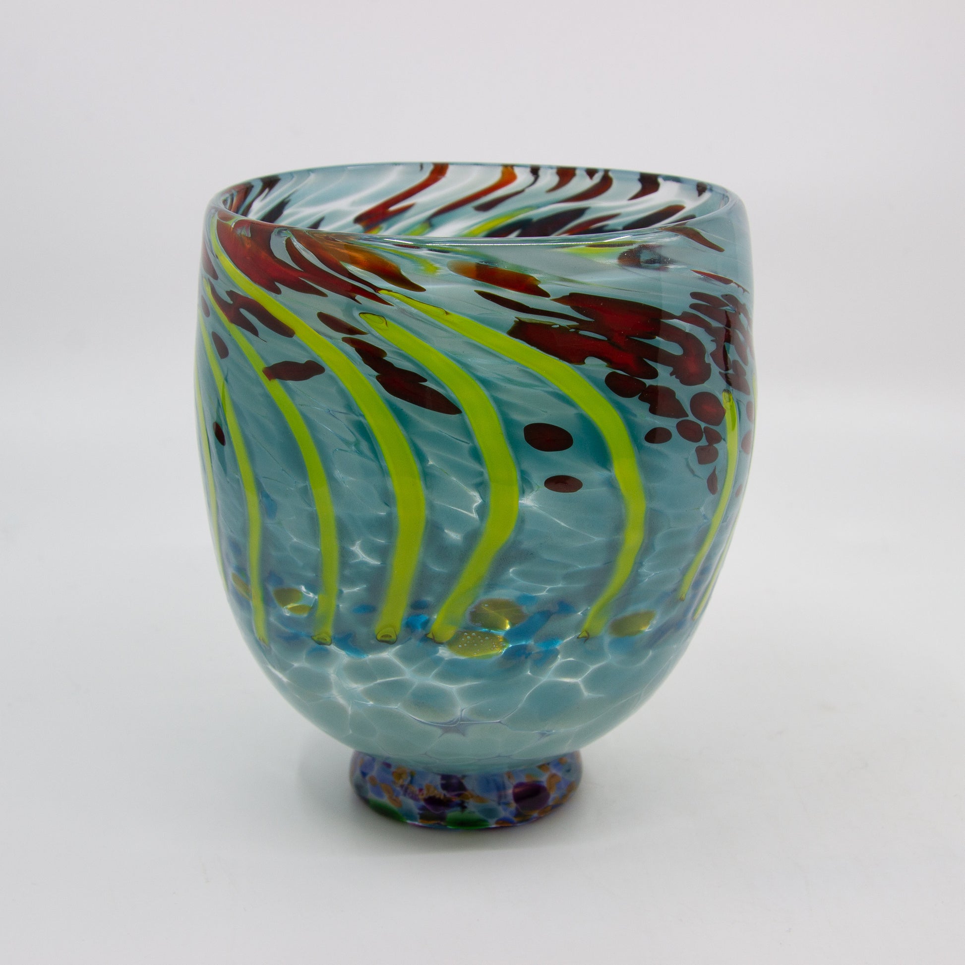 Tall glass bowl in aqua and other colours