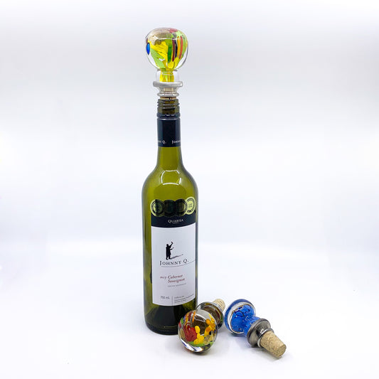 Glass wine stoppers in wine bottle