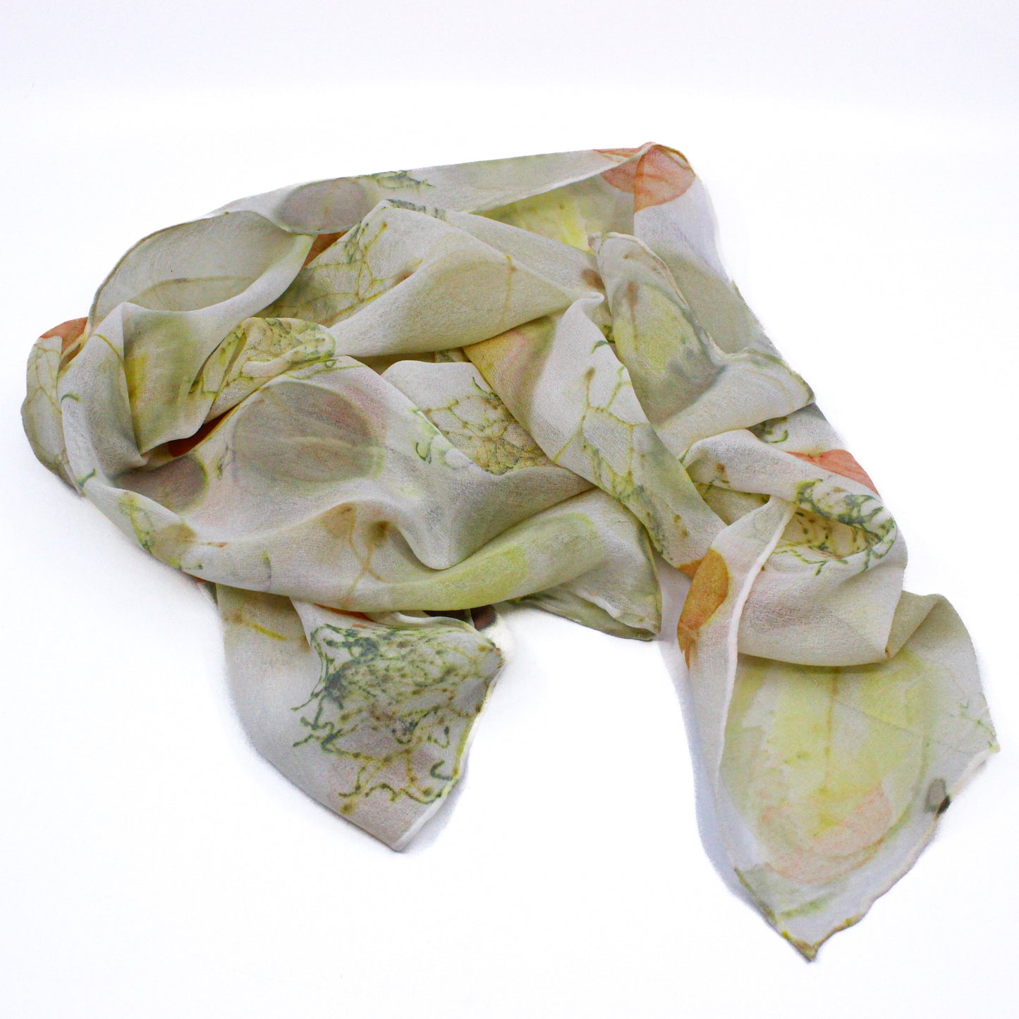 Cream coloured chiffon scarf with green leaves and orange leaves
