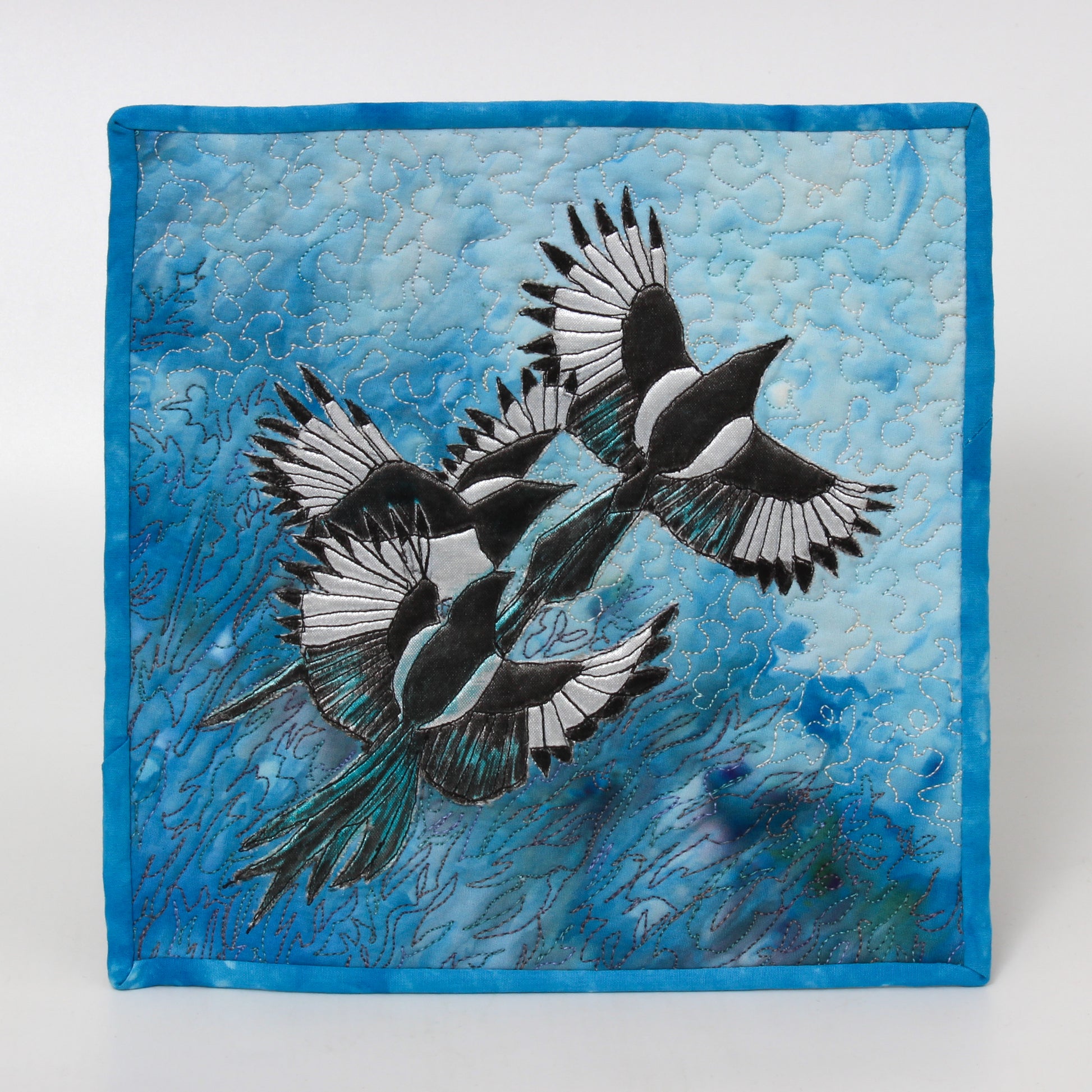 mini quilt of three magpies