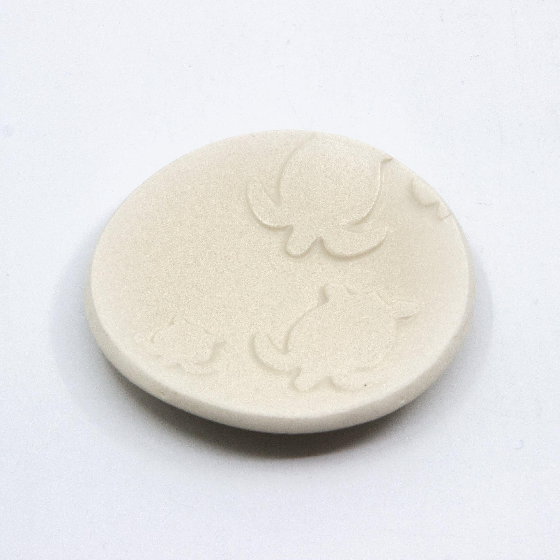 Circle clay dish with turtles