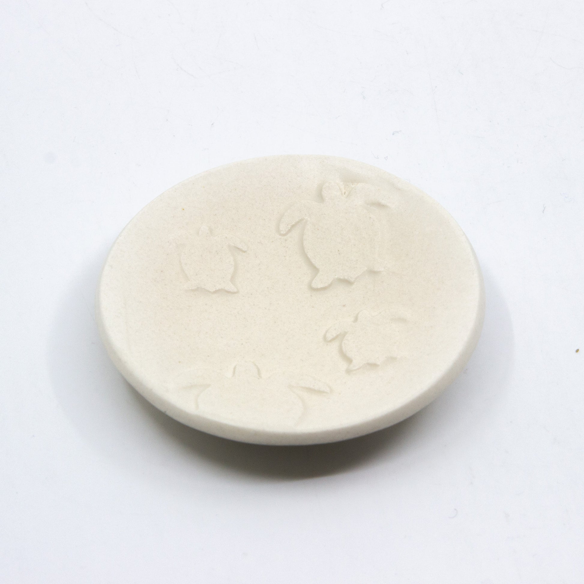 Circle clay dish with turtles