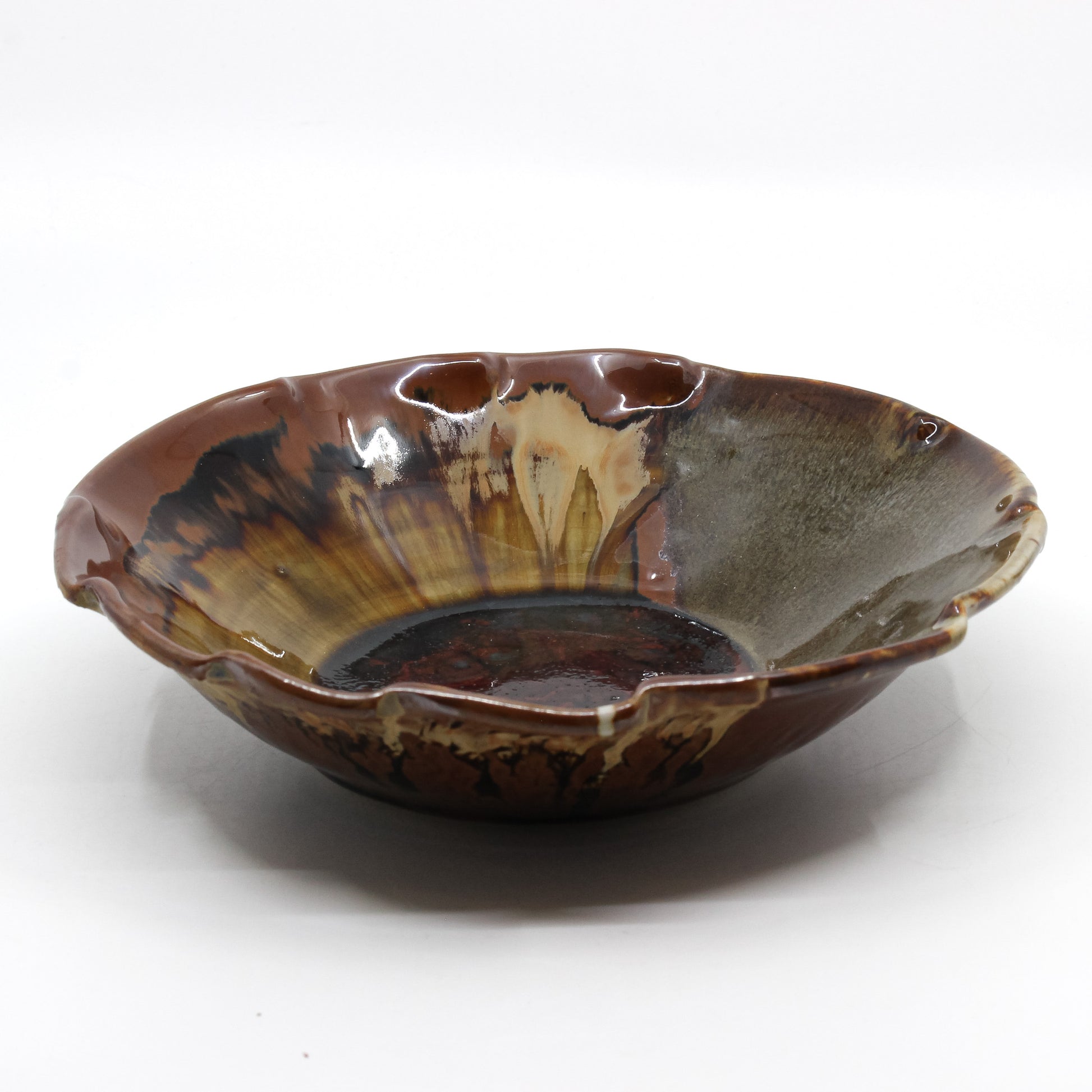 brown clay bowl