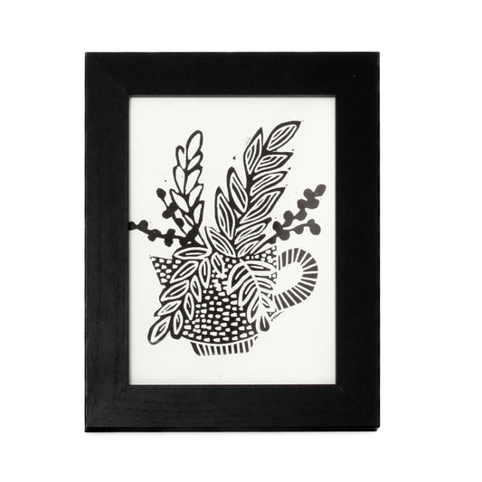linocut of flowers in a tea cup