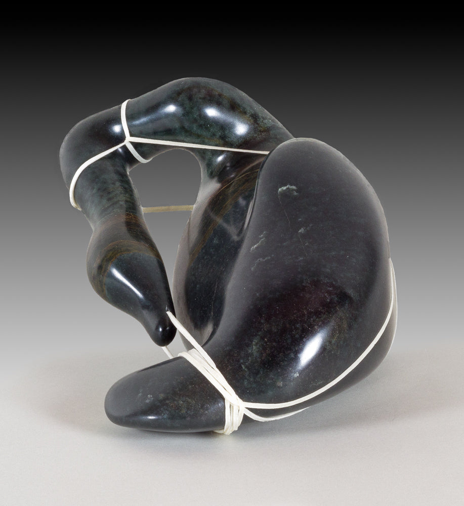 Soapstone carving of a bird like form tied up