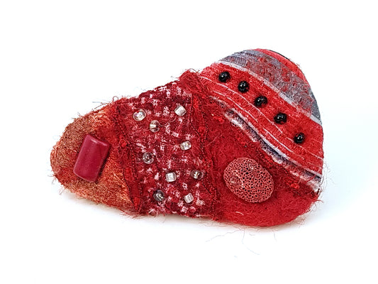 Red triangle felted brooch with beads