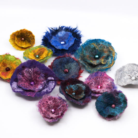 Various colourful flower pins