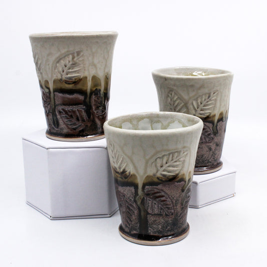 Brown and cream clay glasses with leaf print