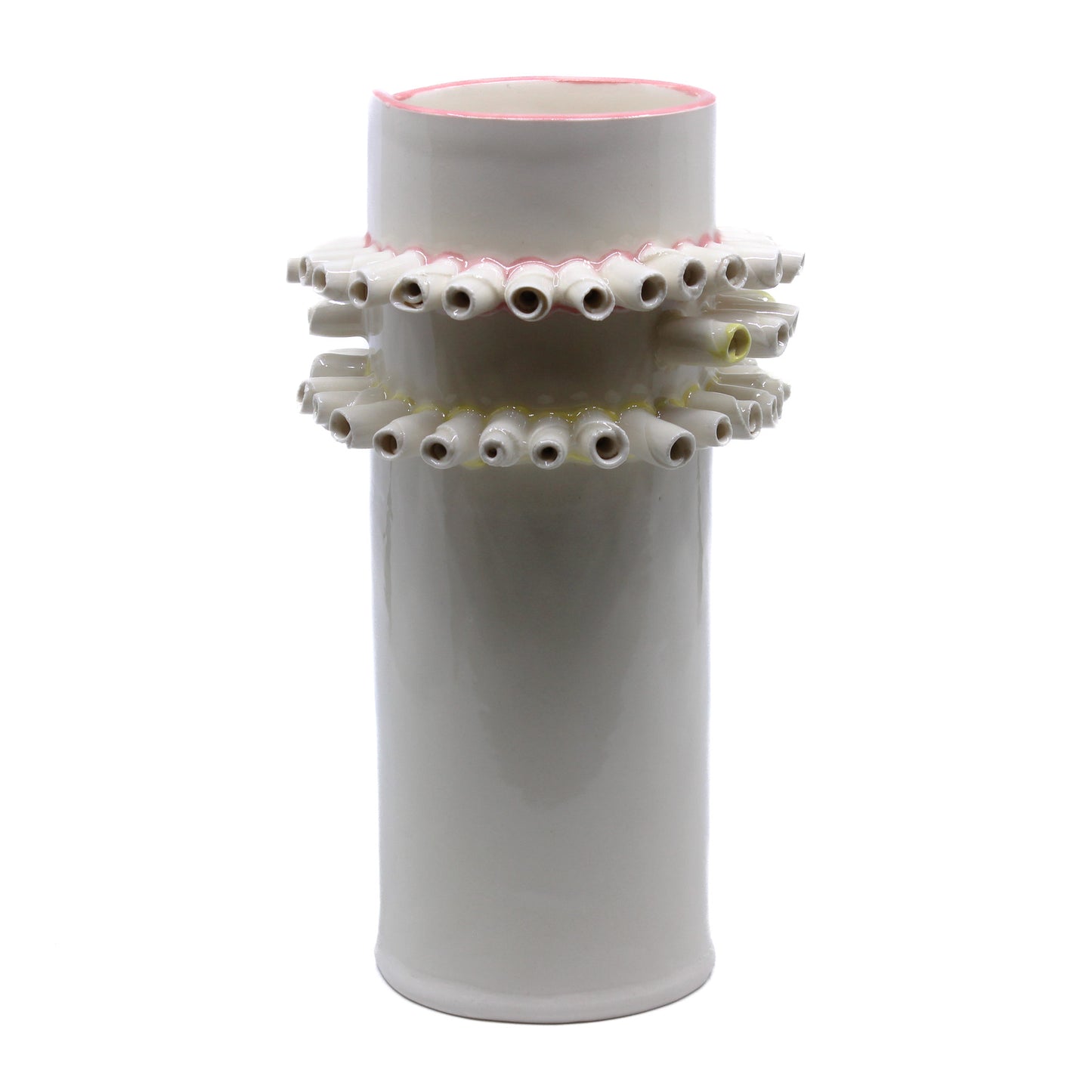 White vase with curled rolls of clay