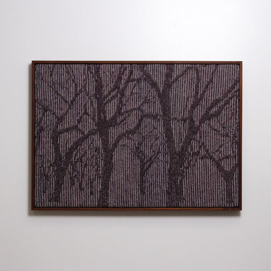 Framed knitted landscape of trees in dark brown, cream and maroon yarn with metallic thread
