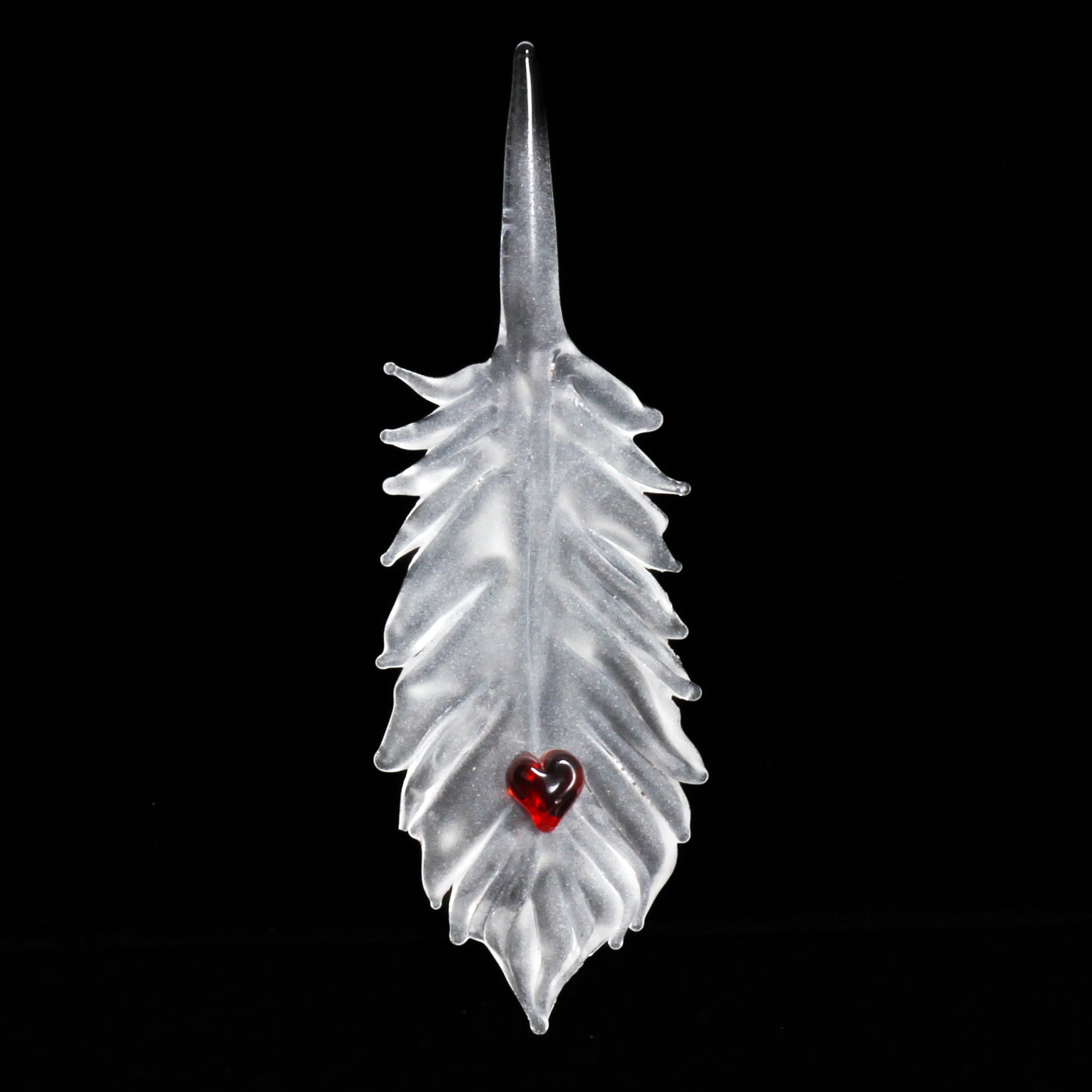 translucent feather with red heart ornament