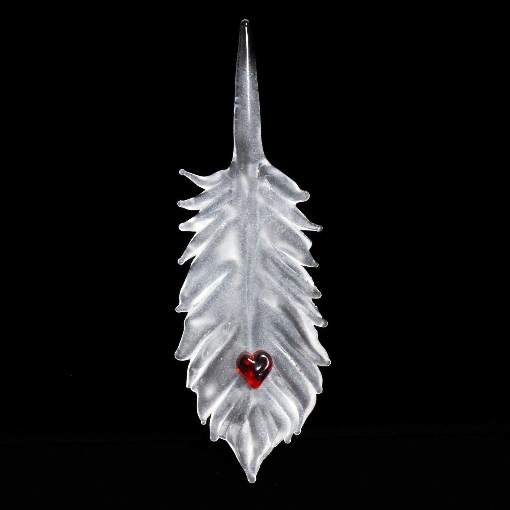 translucent feather with red heart ornament