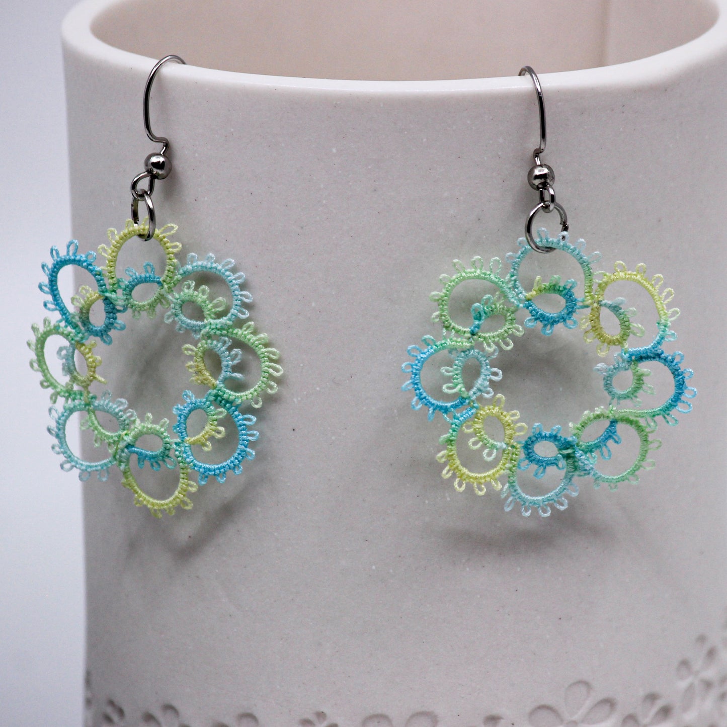 blue, yellow, and green wreath doily earrings