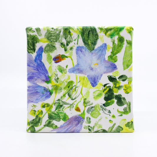 Purple hare bell flowers and green leaves