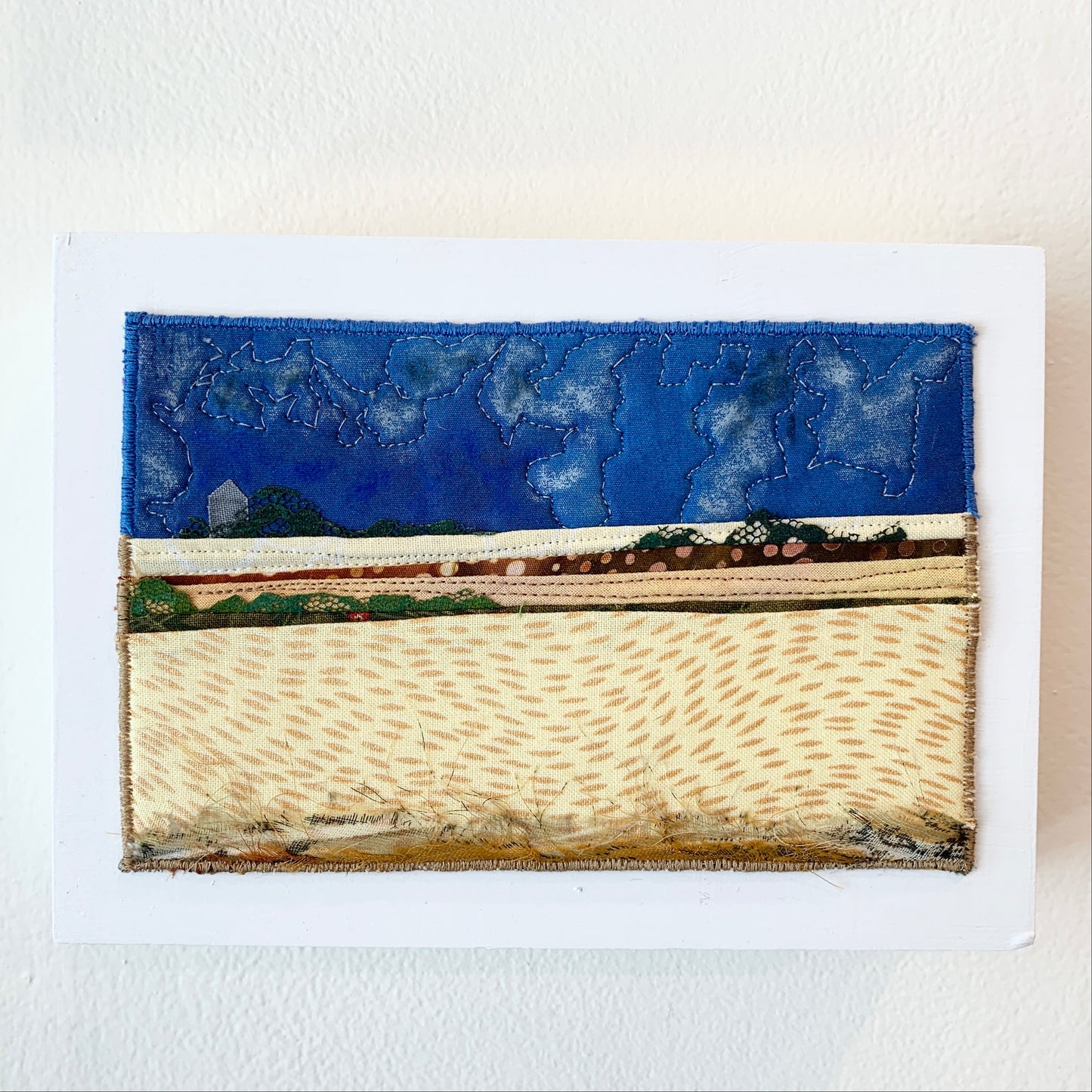 Blue and Brown fiber art of a Saskatchewan landscape