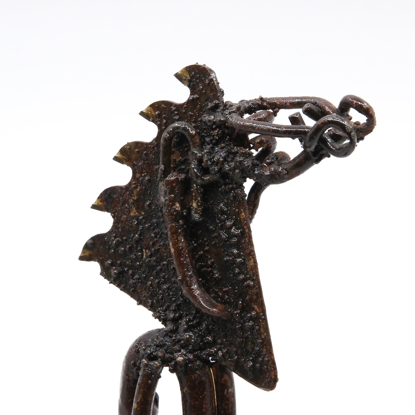 Sculpture of a horse's head made from repurposed metal