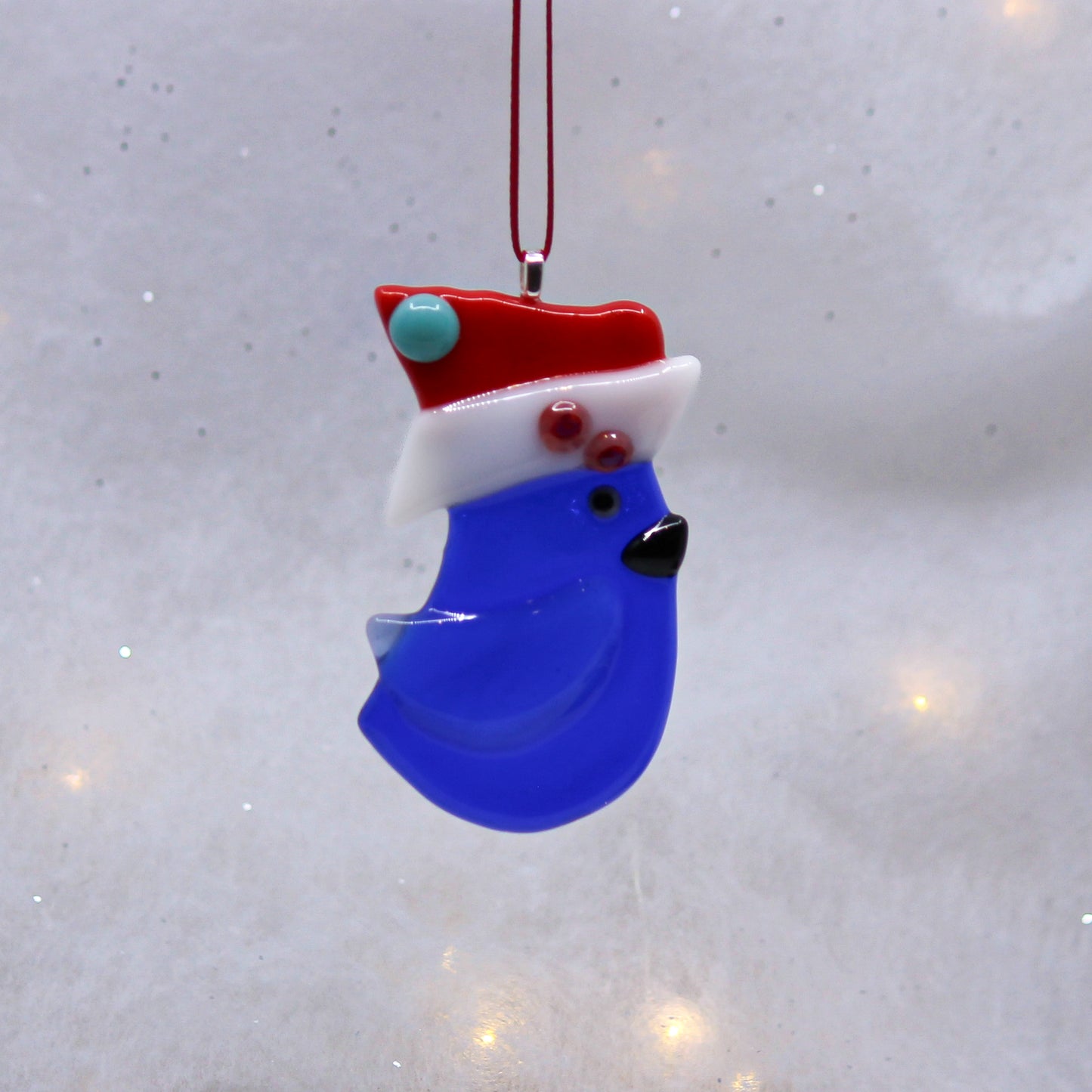 Bluebird Santa Glass Ornament