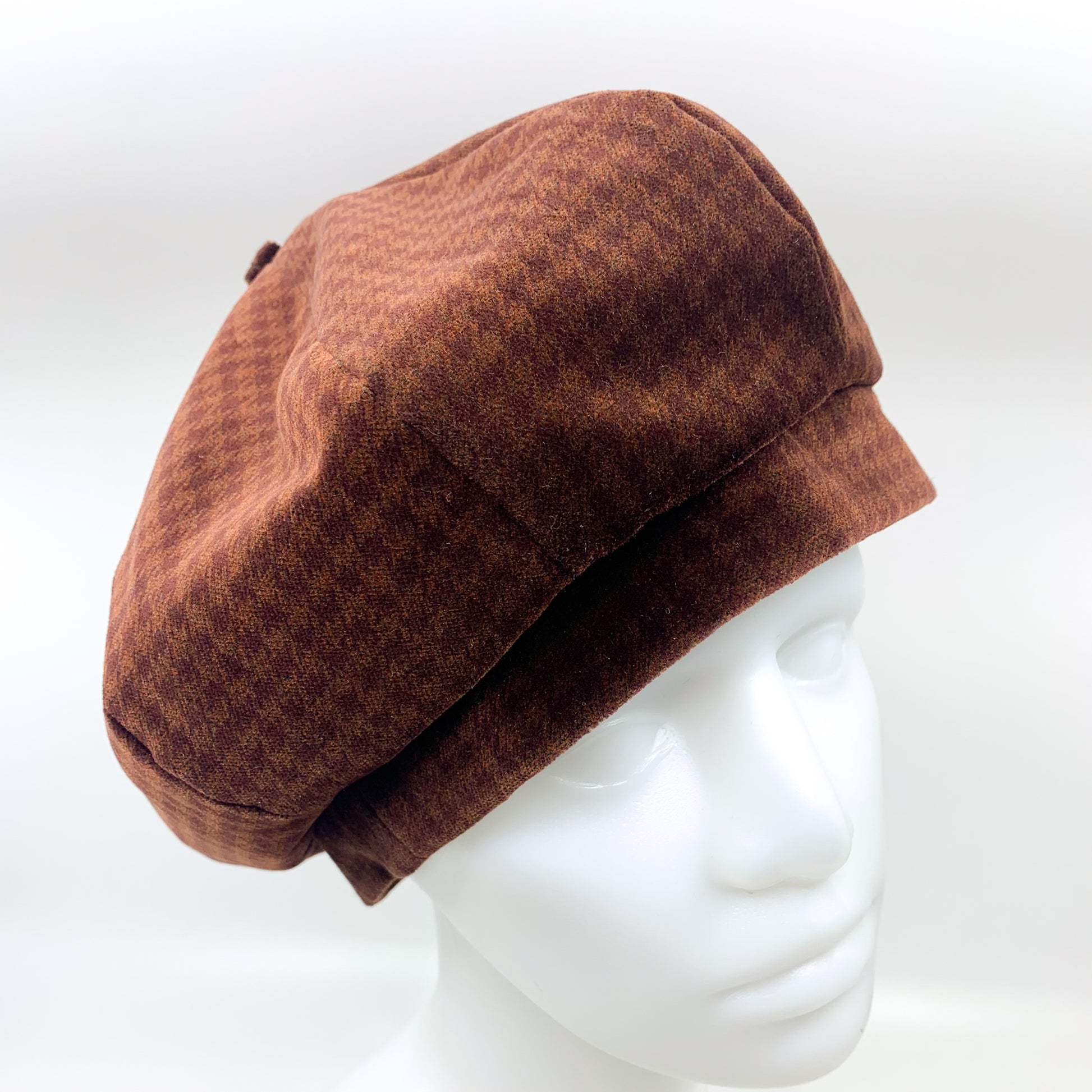 Light brown checkered beret