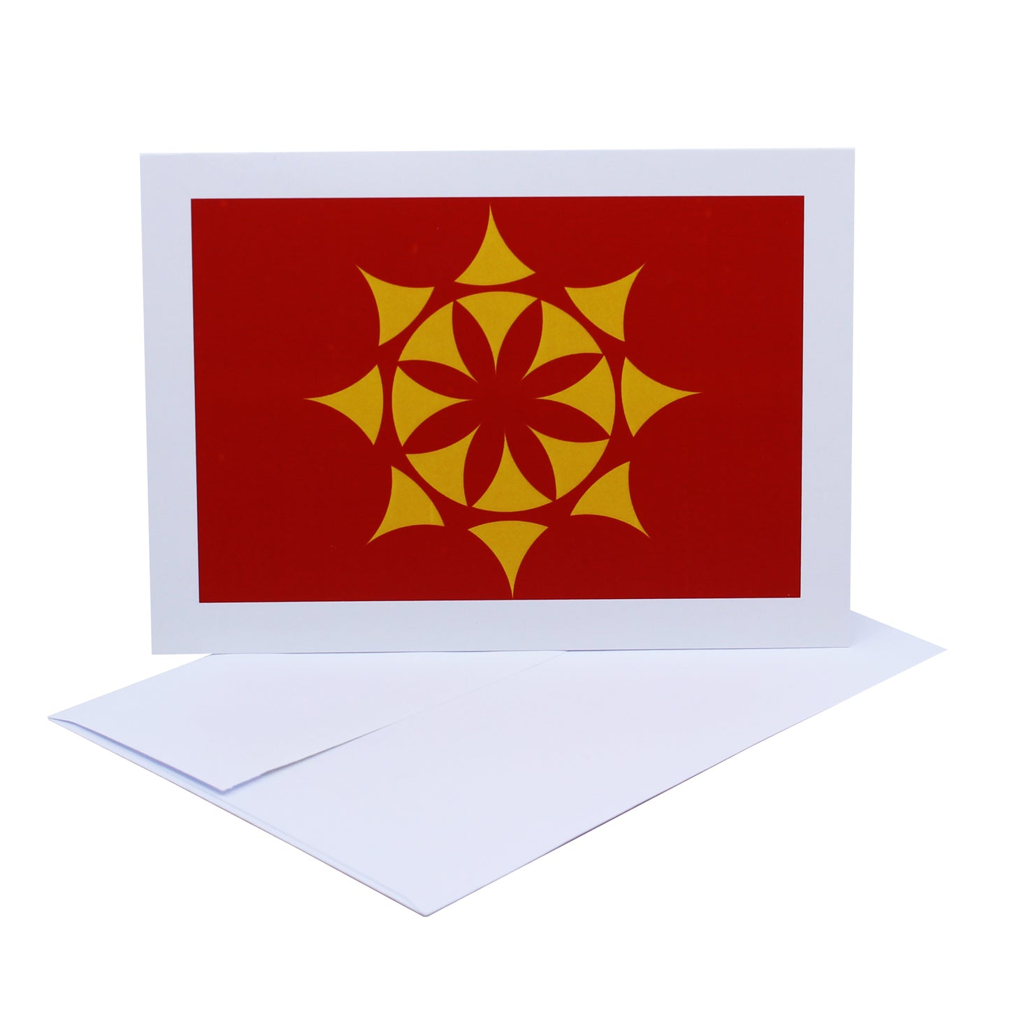 Abstract photographic art card of a yellow geometric star against red background