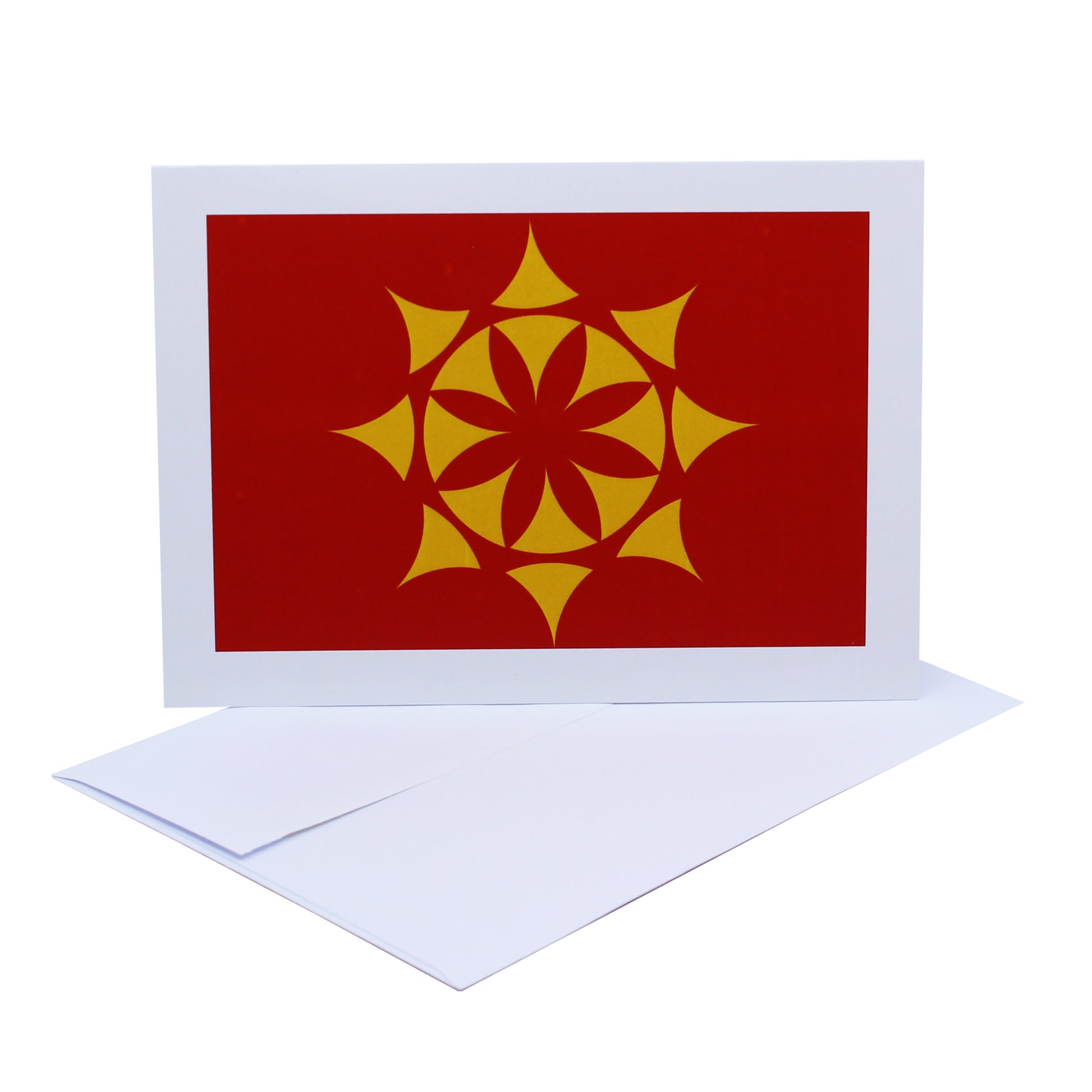 Abstract photographic art card of a yellow geometric star against red background