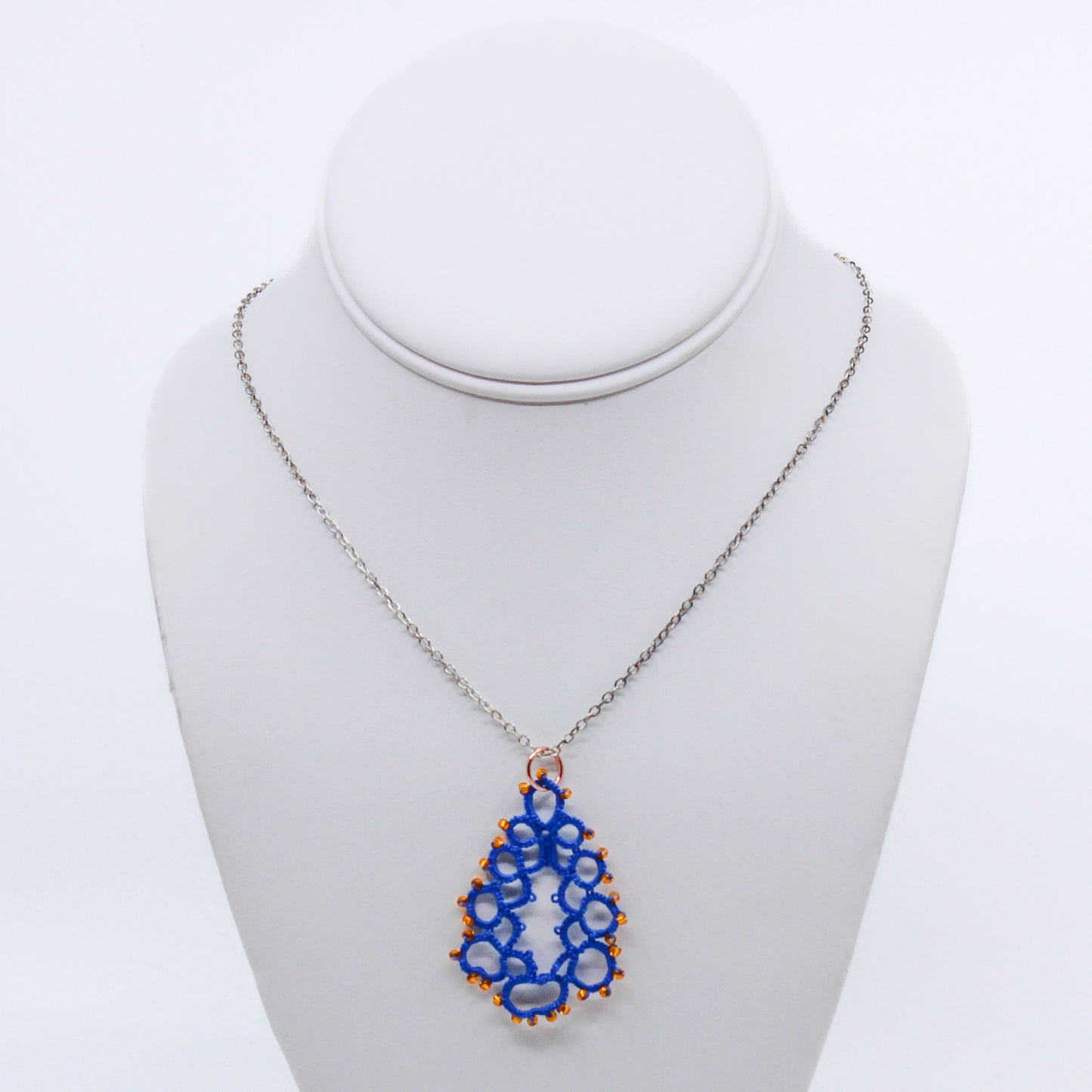 Blue teardrop necklace with yellow beads