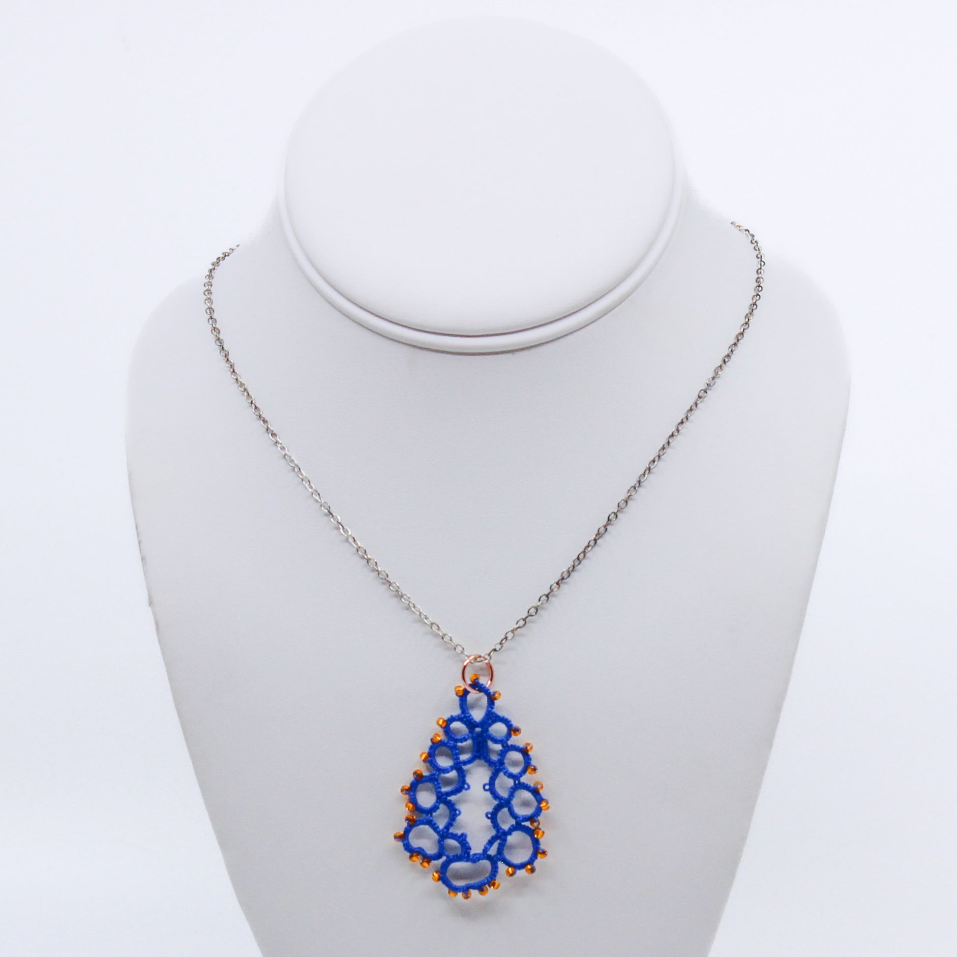 Blue teardrop necklace with yellow beads