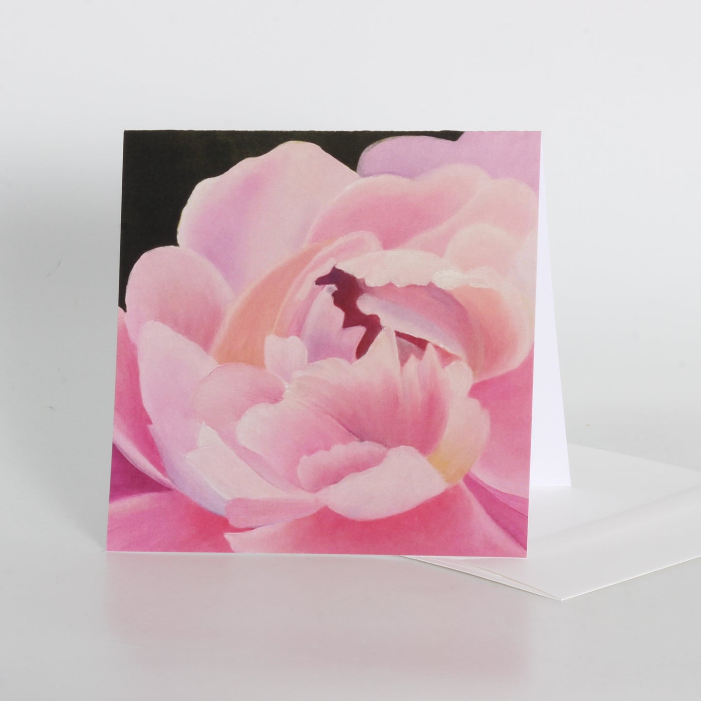 Greeting card of a pink flower