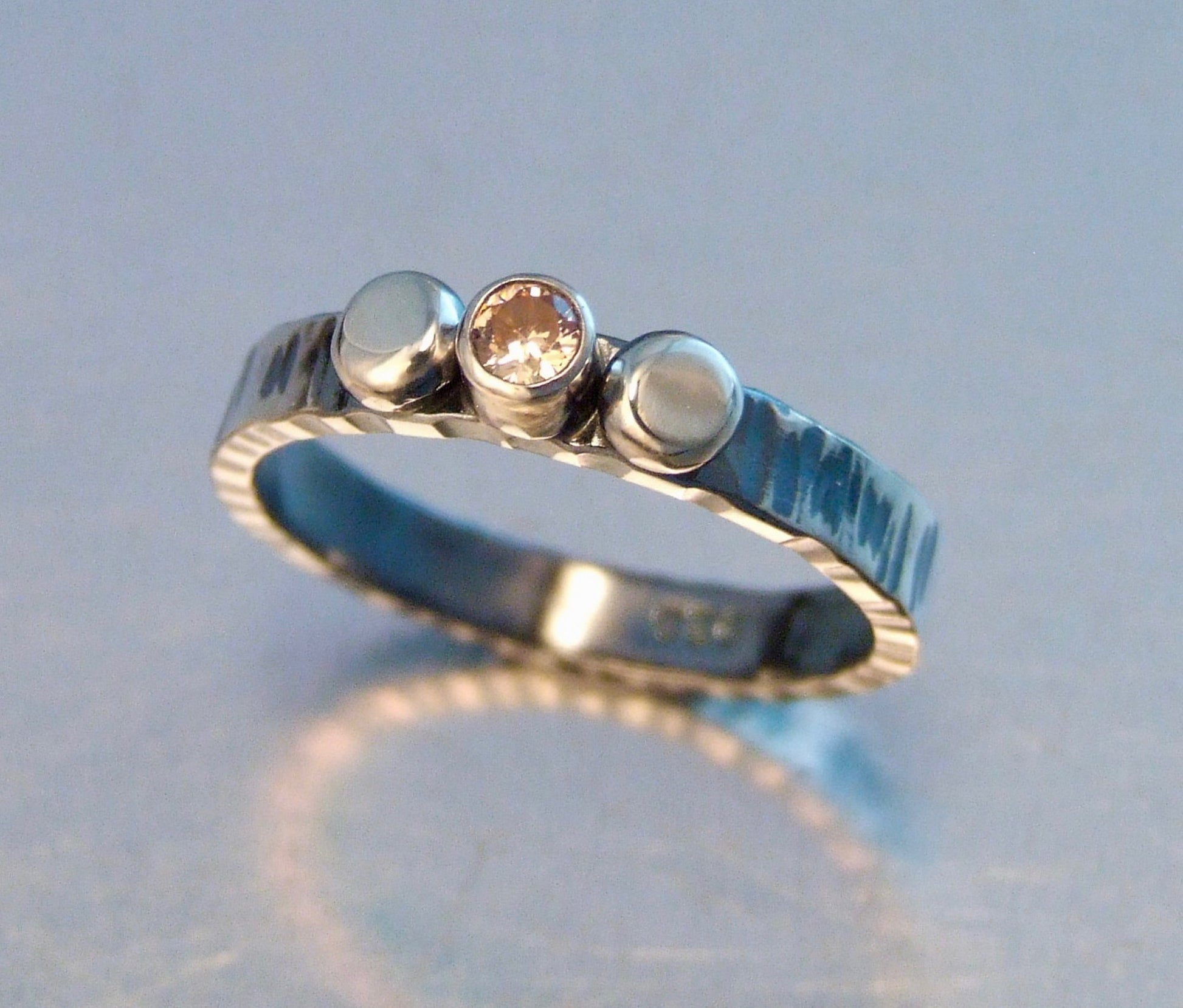 Thin band with silver and zirconia