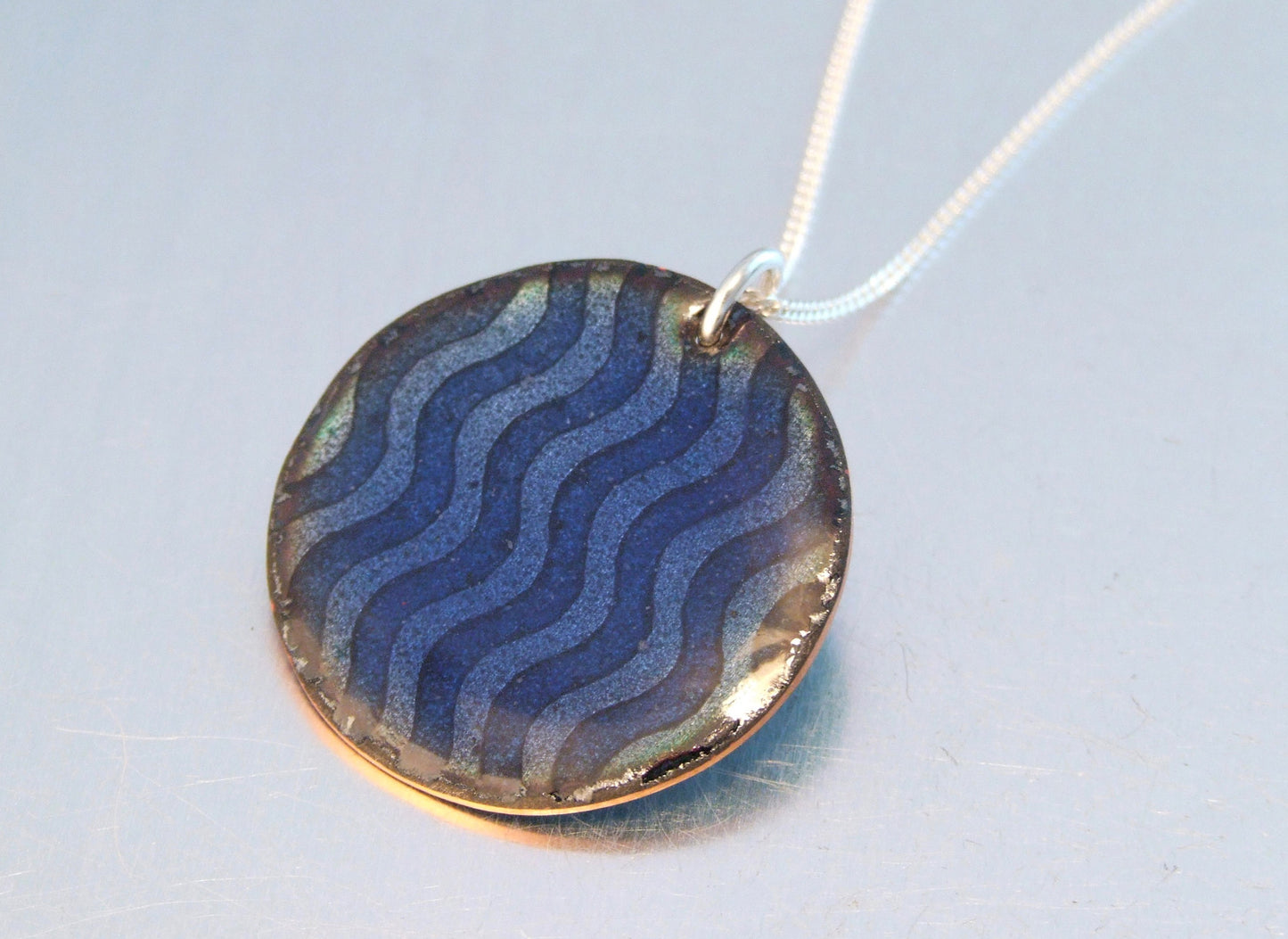 Round blue wave pendant