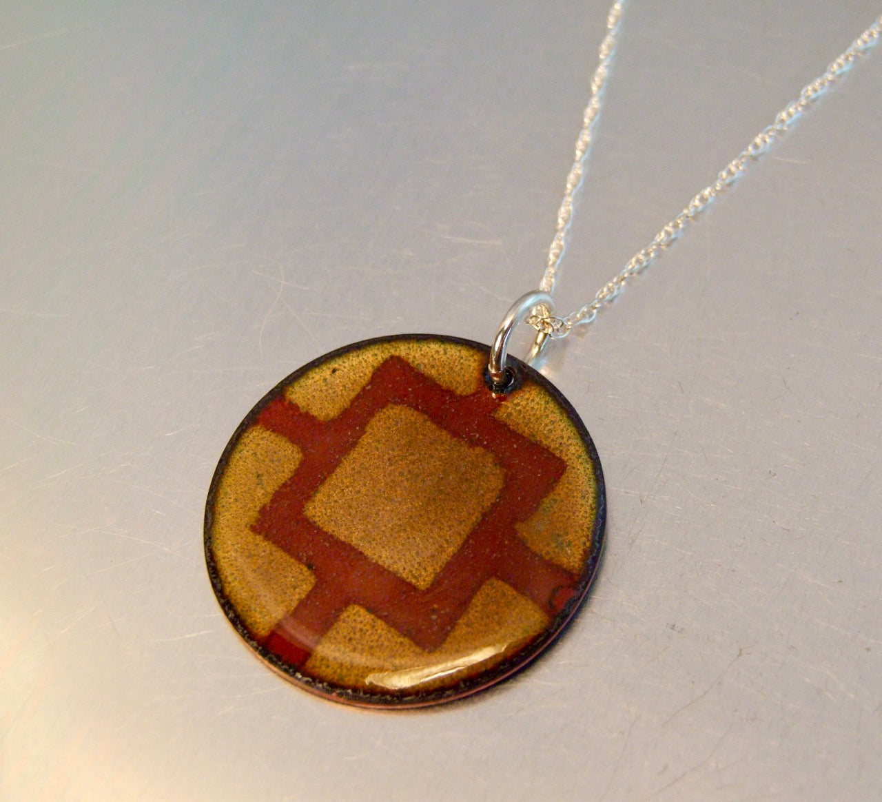 Round caramel pendant