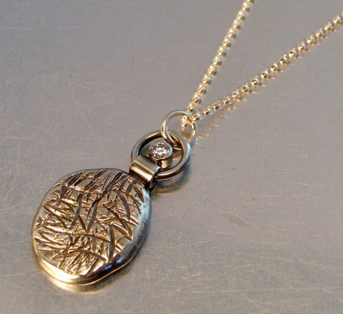 Textured pendant with zirconia