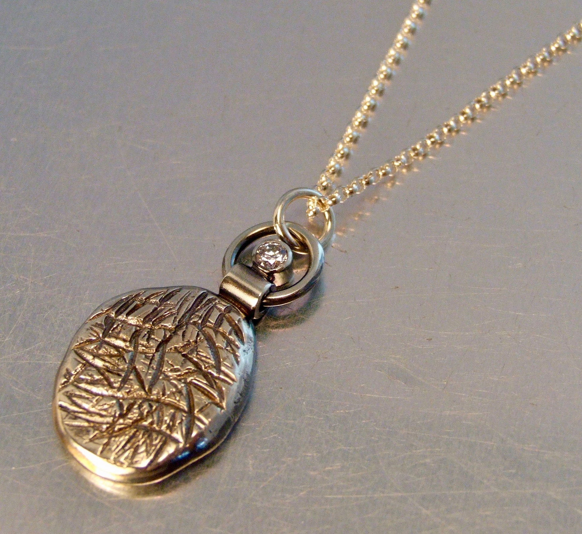 Textured pendant with zirconia