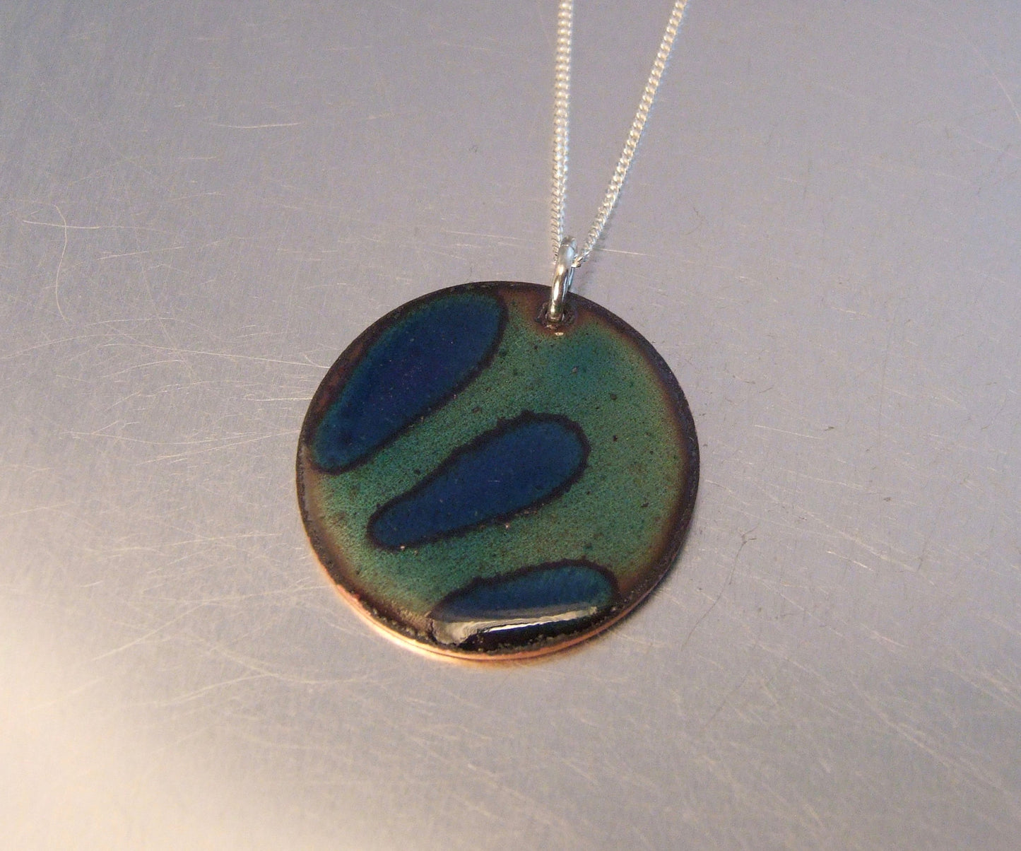 Round teal and blue pendant