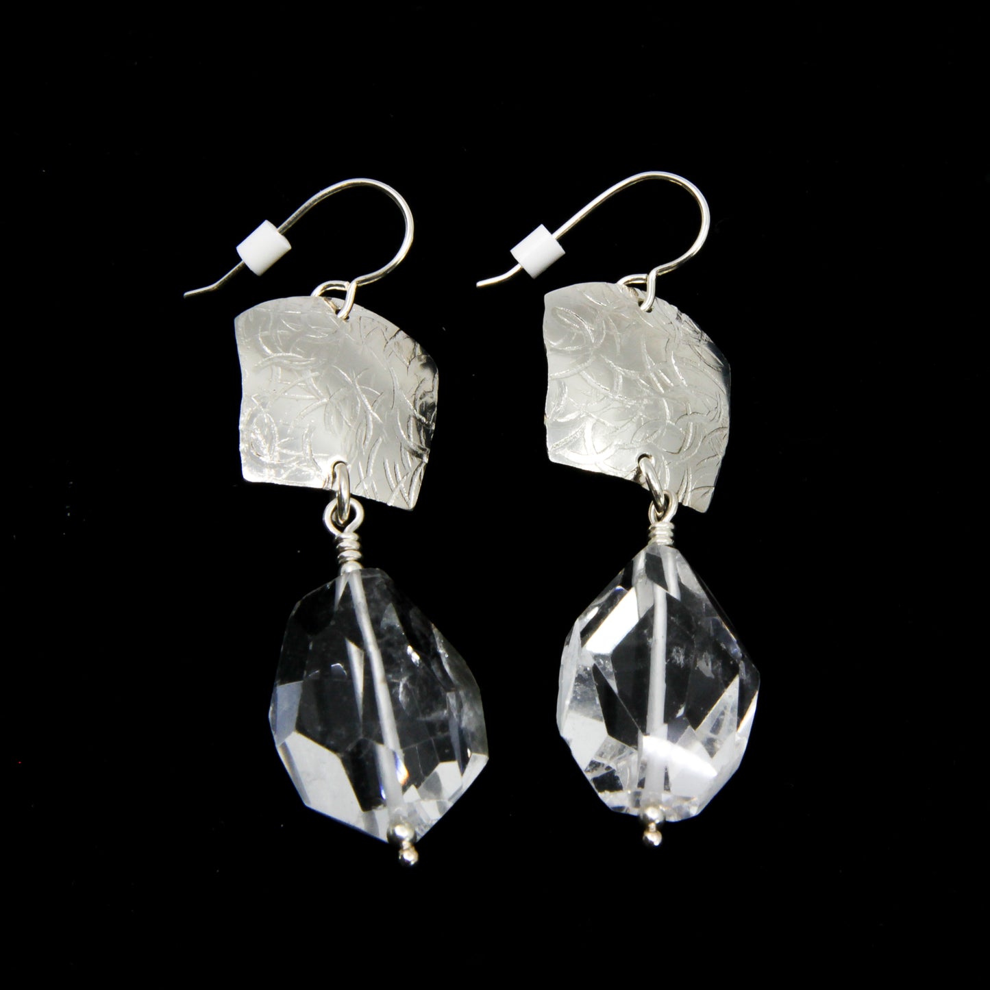 Dangle earrings with sterling silver and clear stone