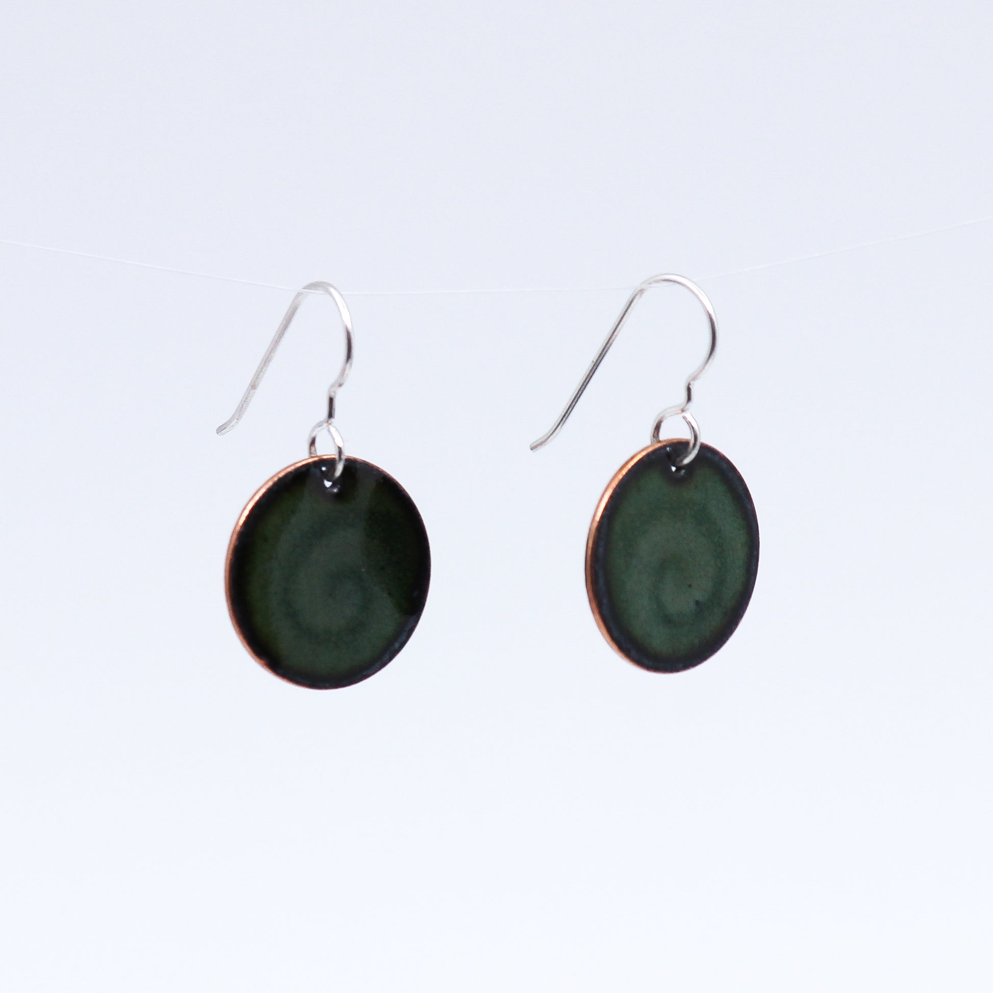 Round swirl green earrings