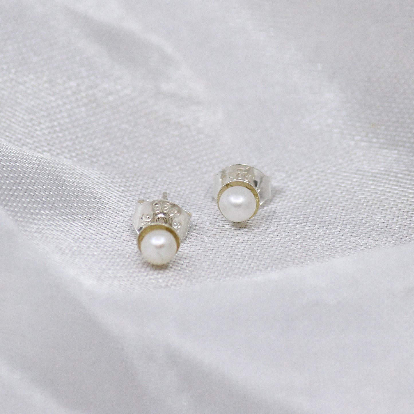White pearl earrings