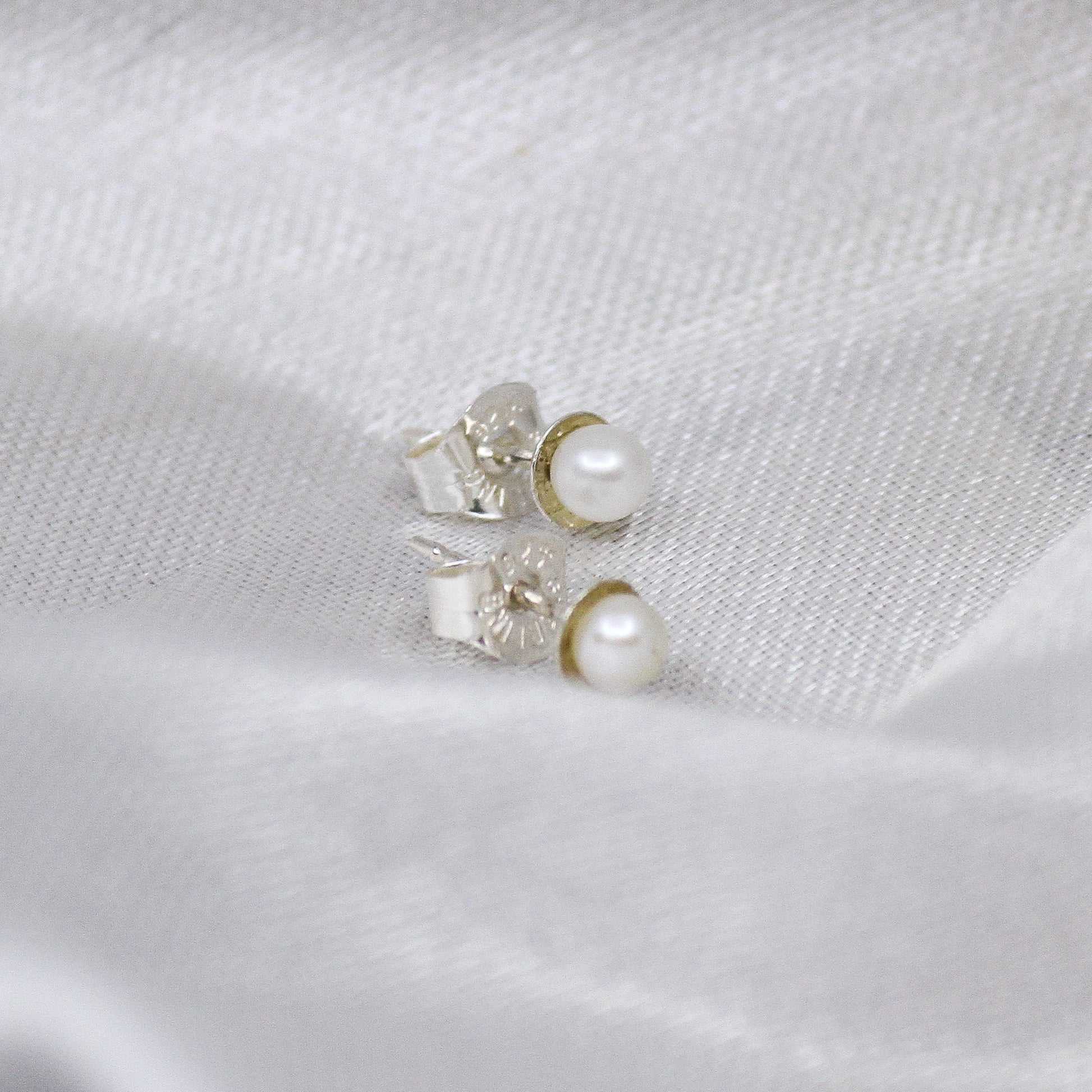 White pearl earrings