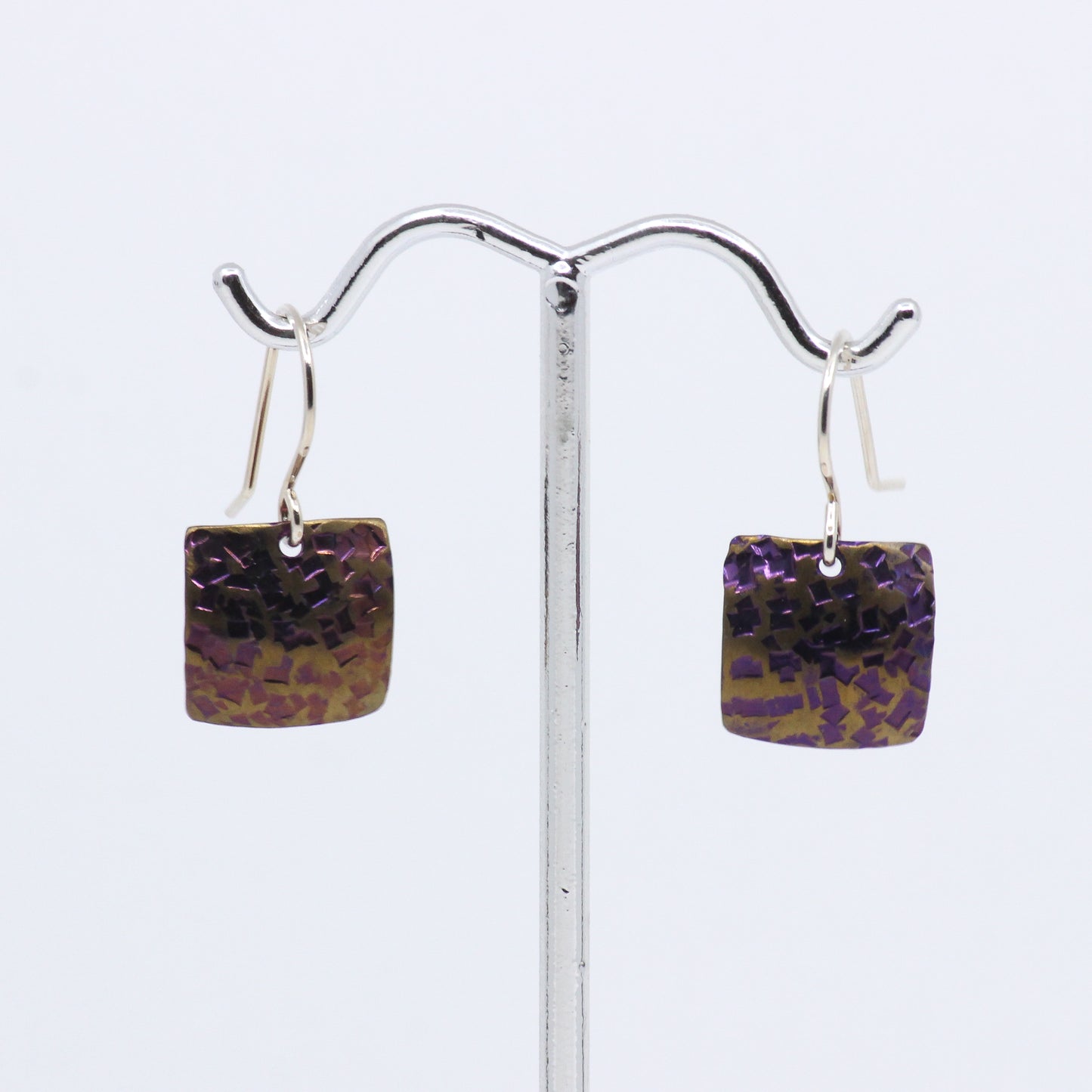 Purple and gold earrings