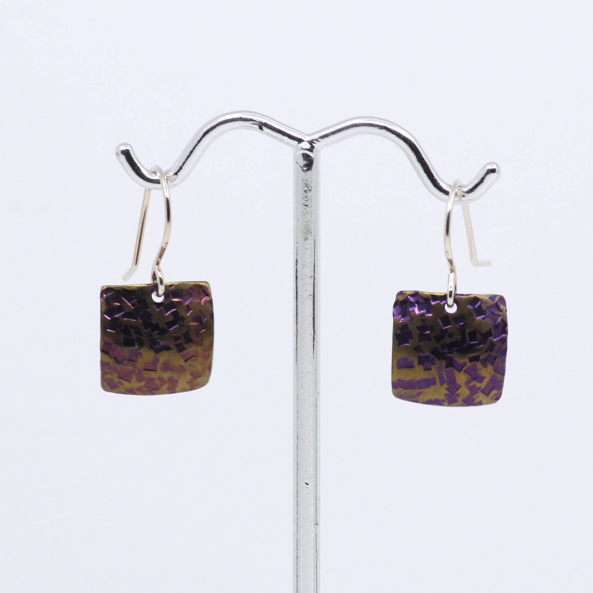Purple and gold earrings