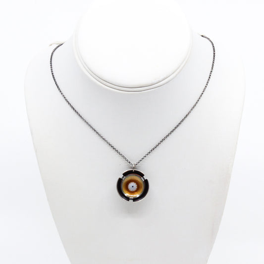 Round necklace with orange centre
