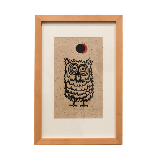 Woodcut of owl and eclipsing moon