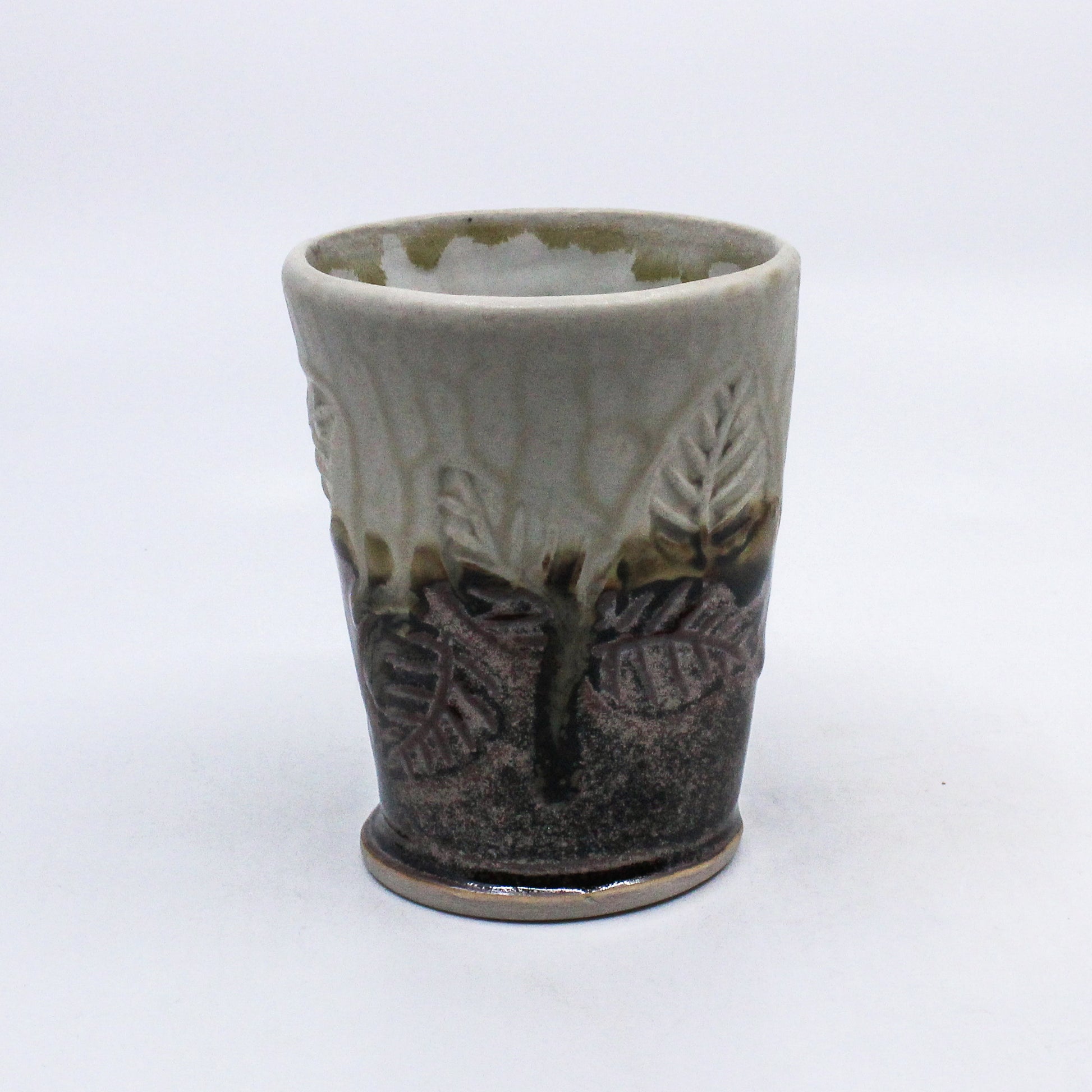 Brown and cream leaf printed clay glass