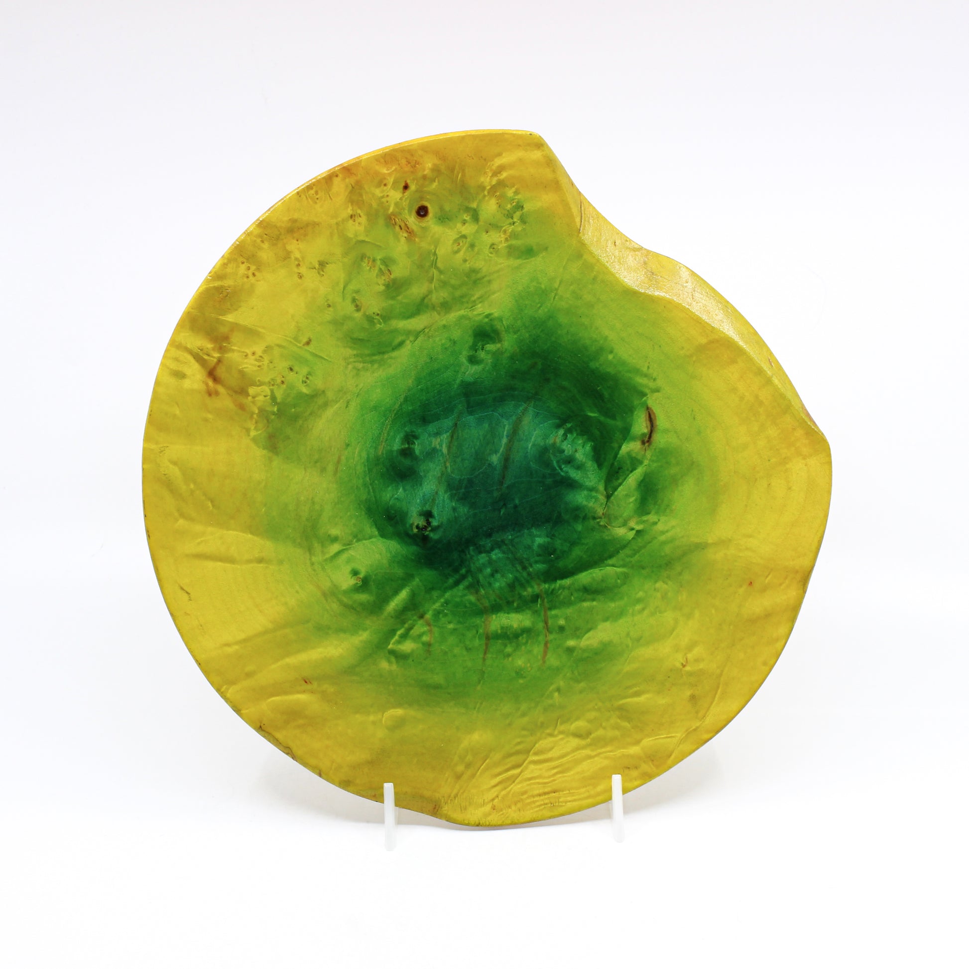 Wood plate that is dyed a gradient rim to center yellow to green. Plate is not circular, but with an attractive notch carved out from 12 to 2