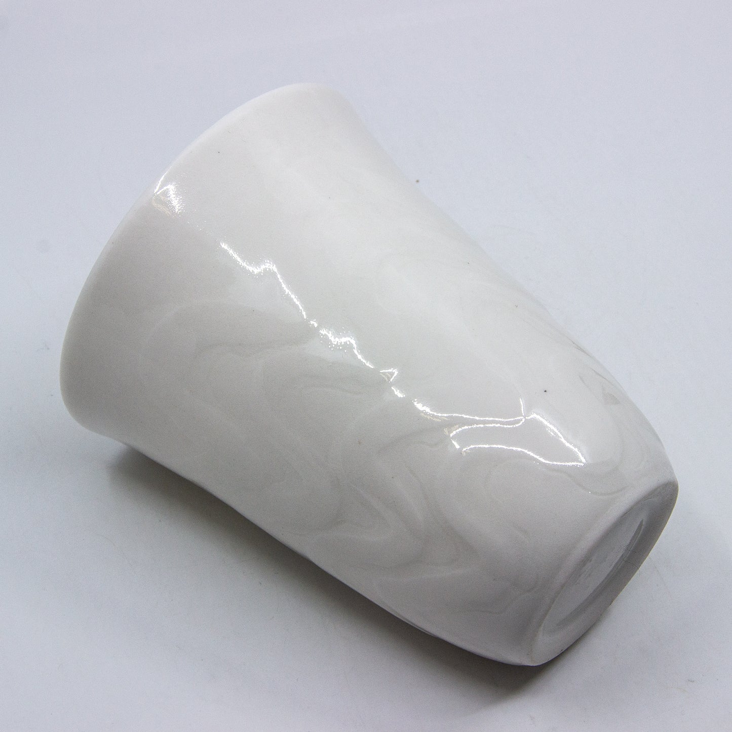 white porcelain candle holder